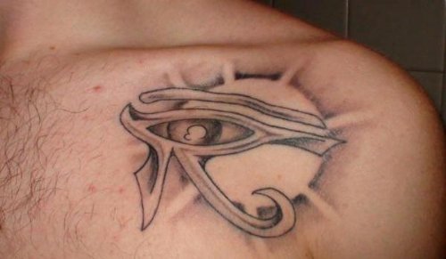 Grey Ink Sun And Horus Eye Tattoo On Left Shoulder